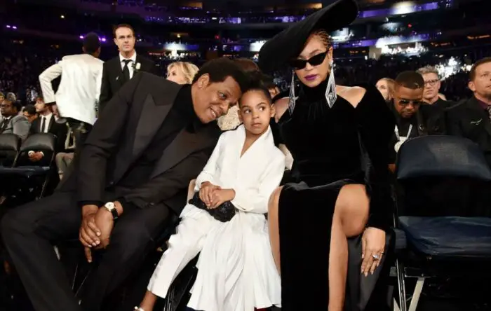 Blue Ivy Carter and parents Jay-Z and Beyonce during an event