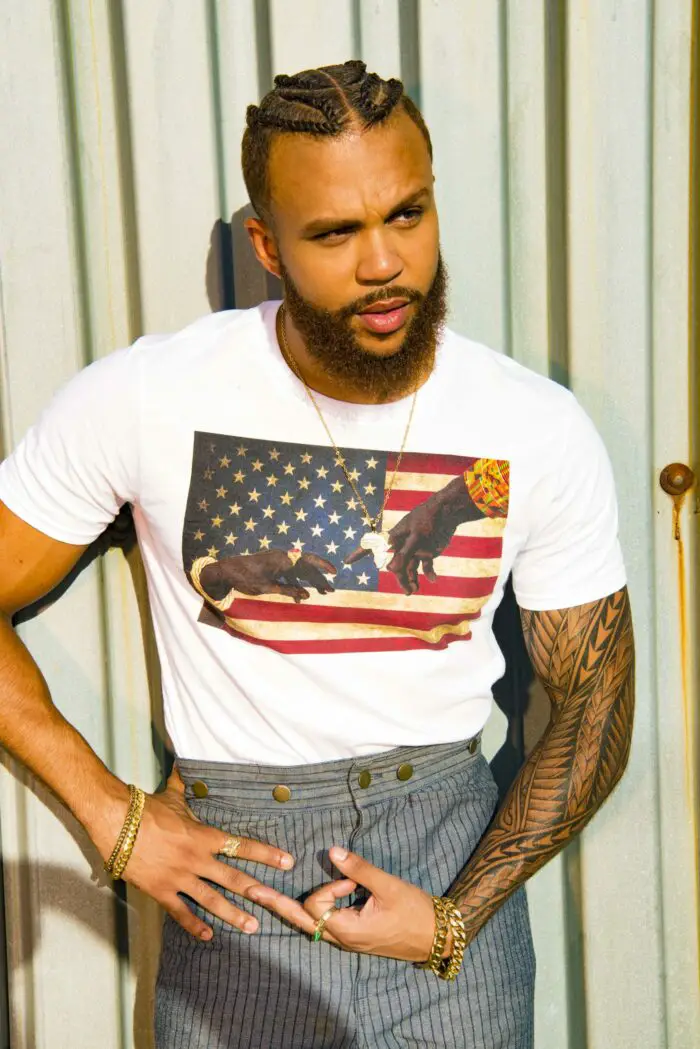 Jidenna looks dapper in this US tshirt depicting African and America uniting