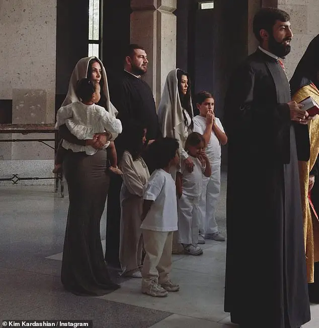Photo showing Kourtney, and Kim and their kids as they wait patiently for bapism