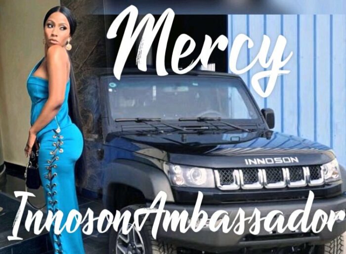 Mercy with her Innoson new car