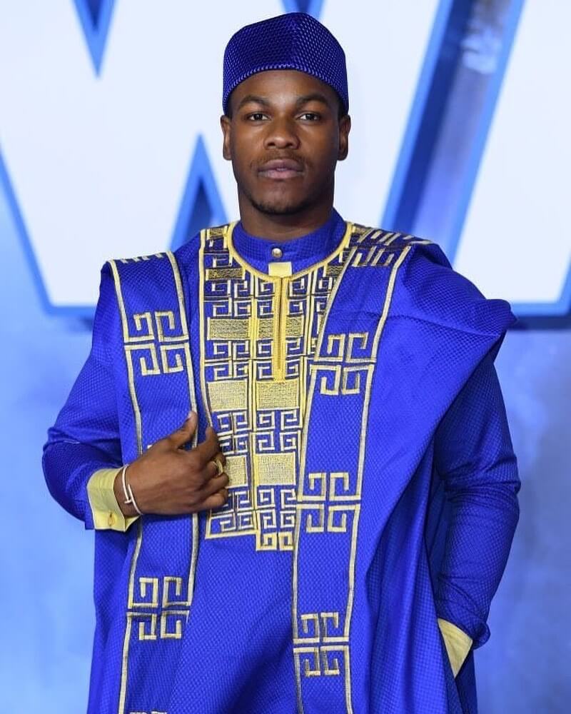 John Boyega and his family dazzle in blue and yellow Nigerian traditional outfits for Star Wars premiere