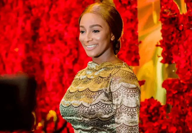 DJ Cuppy takes inspiration from Cardi B, gifts her manager 500k [video]