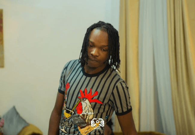 Naira Marley shows off expensive cars following car theft allegations