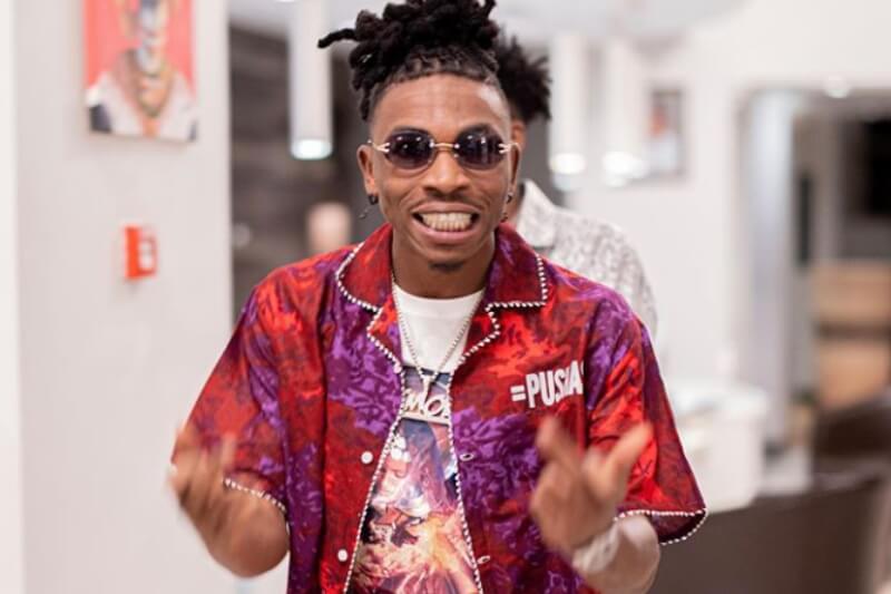 Mayorkun offers to help protester whose car was destroyed