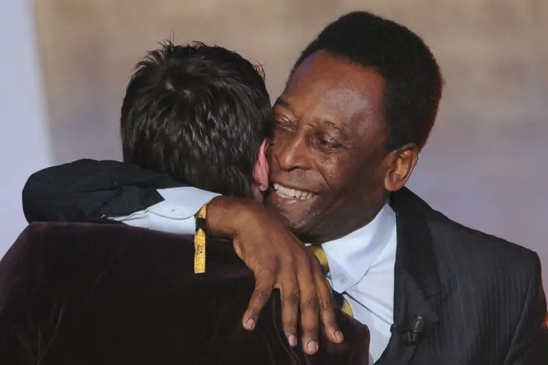 Messi and Brazilian legend Pele hugs one another