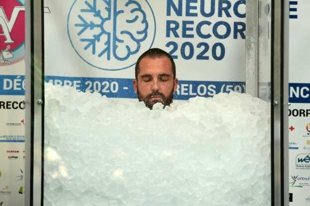 Romain Vandendorpe is now being called "ice man" after he set a new world record for the longest time spent sitting in ice cubes