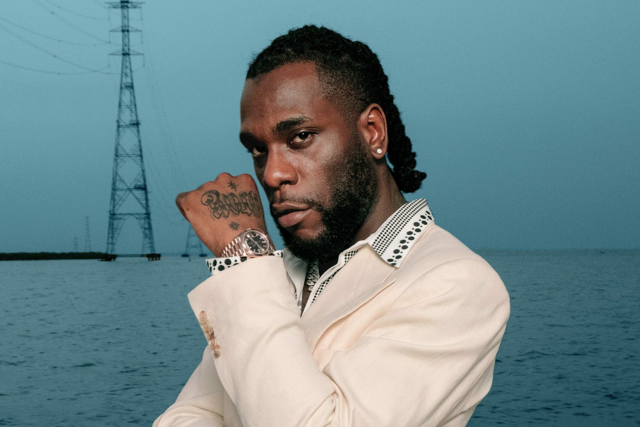 [Watch] Twitter user accuses Burna Boy convoy of damaging his car