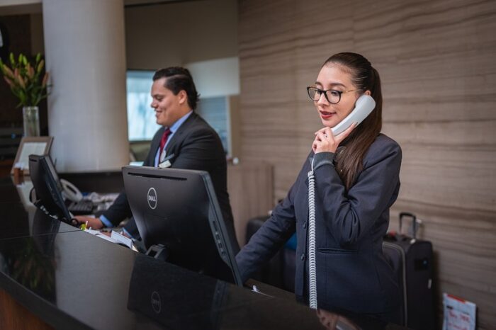 receptionists on a phone call