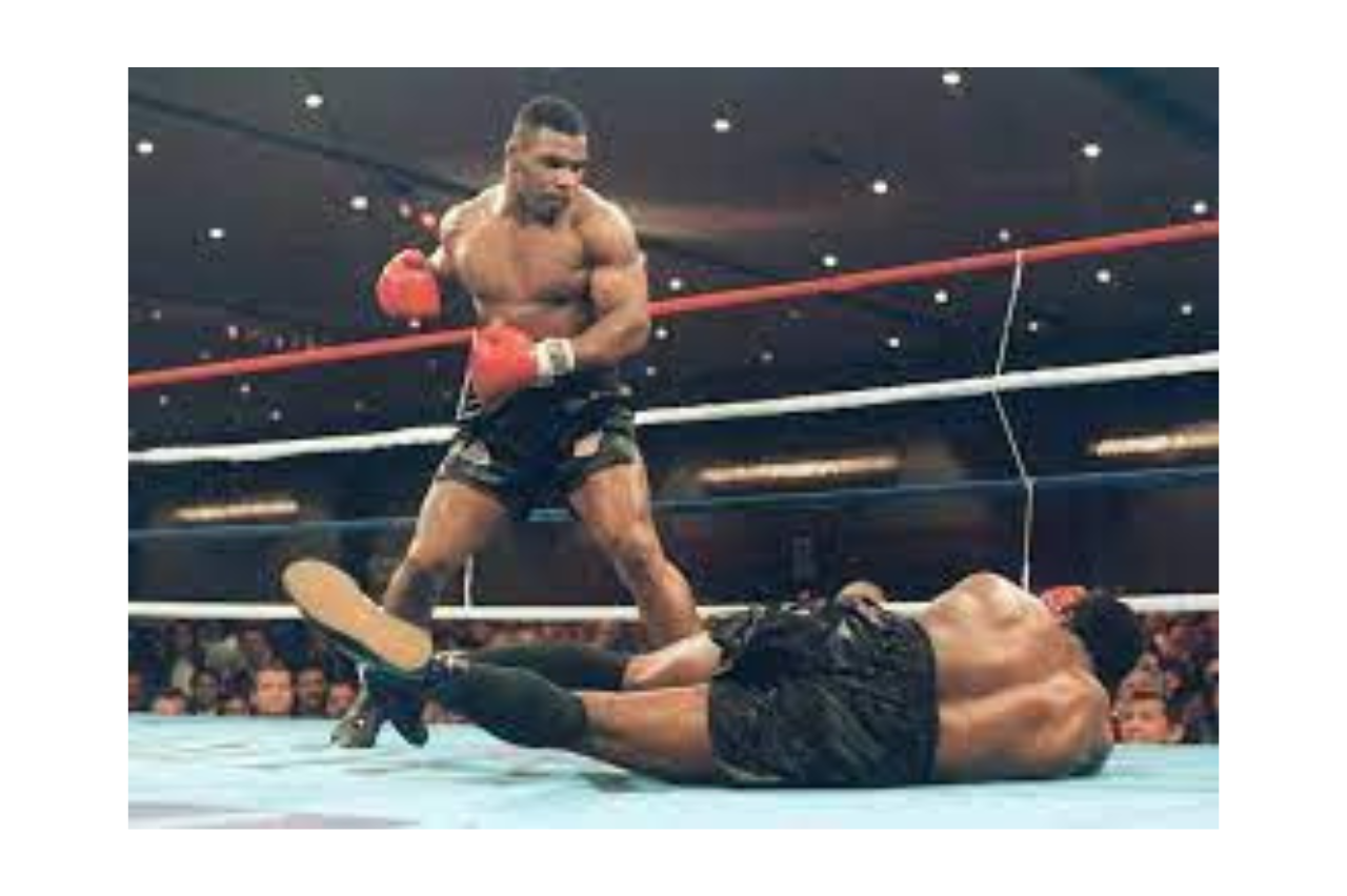20-year-old Mike Tyson floors Trevor Berbick to become the youngest heavyweight world champion in history. 