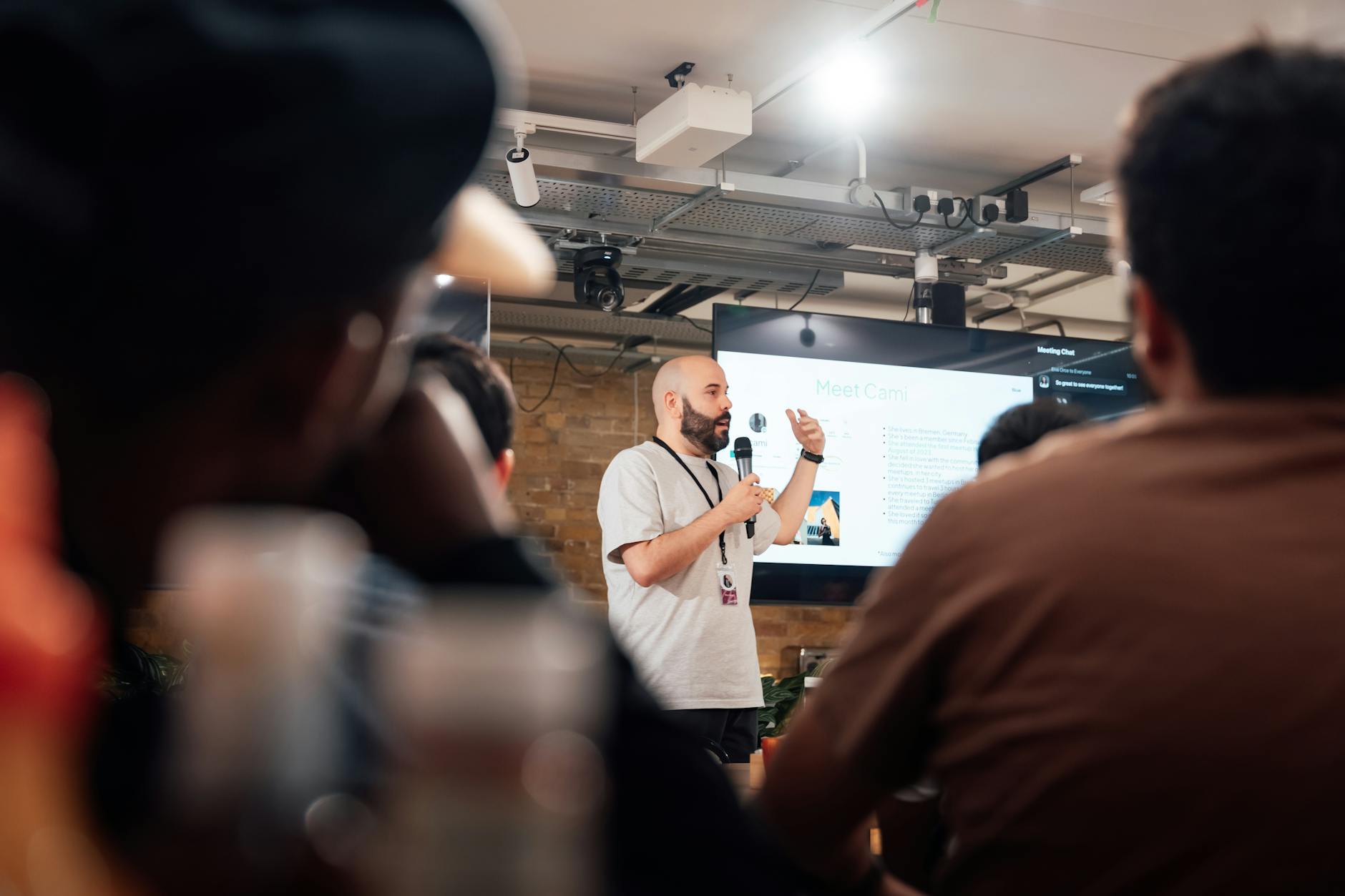 Young animator presenting their portfolio at an animation industry networking event