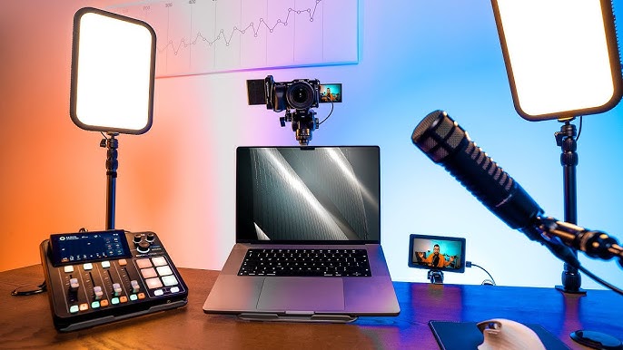 Professional YouTube creator studio with camera, microphone, monitors showing editing software