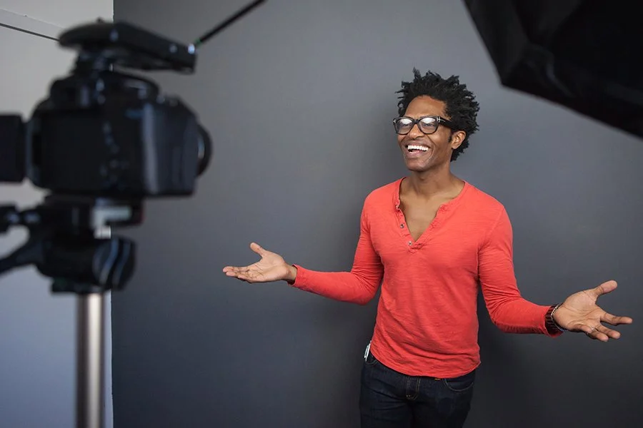 Actor recording a self-tape audition at home with professional setup
