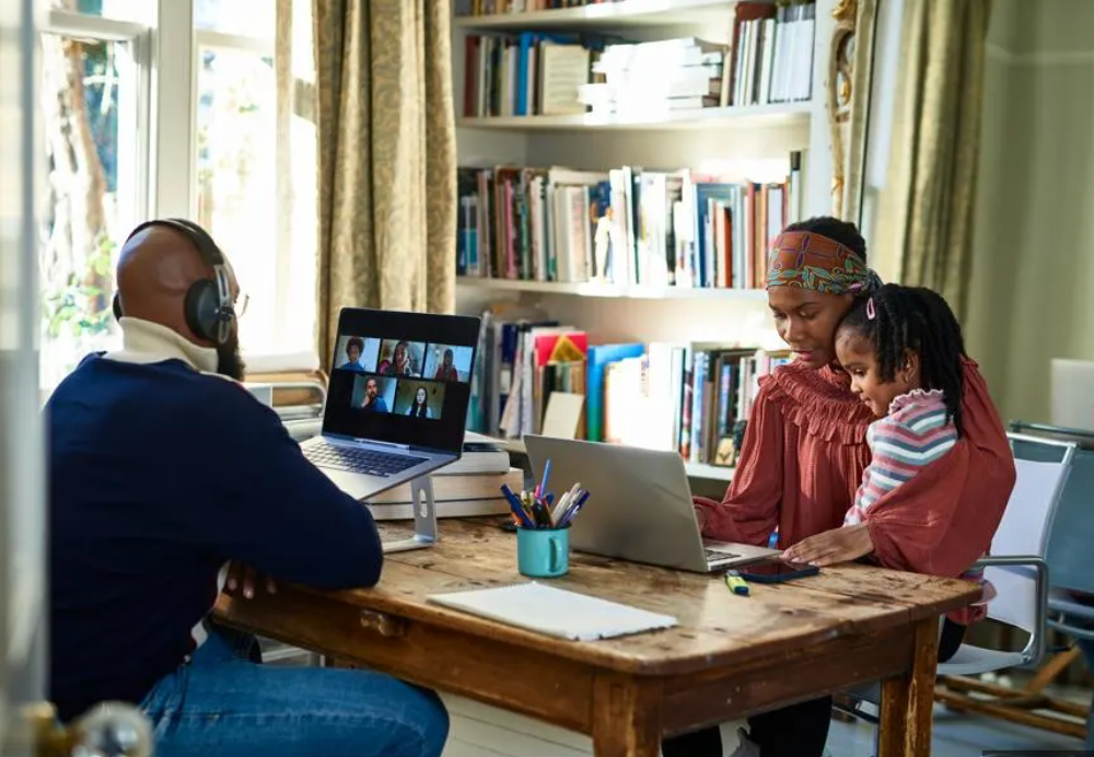 Parent and child meeting with a talent agent in a professional office